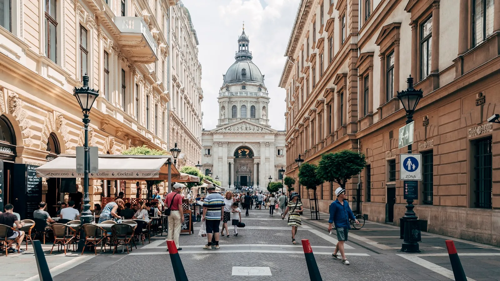 A lively pedestrian street with cafés near St. Stephen's Basilica in Budapest